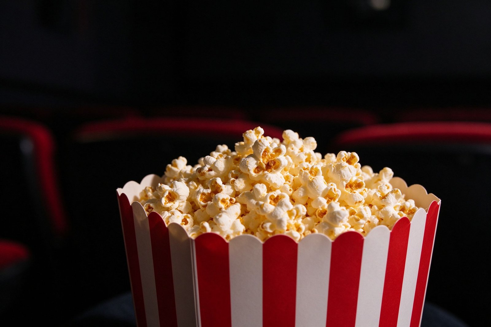 Popcorn and a scary movie on TV at night